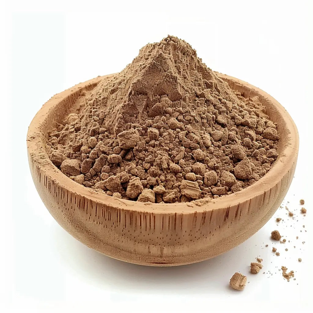 Bowl of finely ground Amchur (unripe mango) powder on a white background - Canada Vitalife