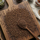 Whole Grains of Paradise seeds (Aframomum melegueta) for traditional West African seasoning and gourmet infusions.