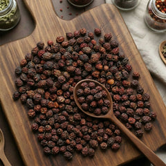 Whole dried Hawthorn berries (Crataegus oxyacantha) for traditional botanical decoctions and fruit infusions.