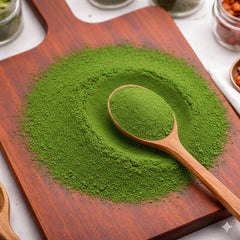Vibrant green Kale powder in a ceramic bowl, showcasing its fine texture and rich color – CanadaVitaLife