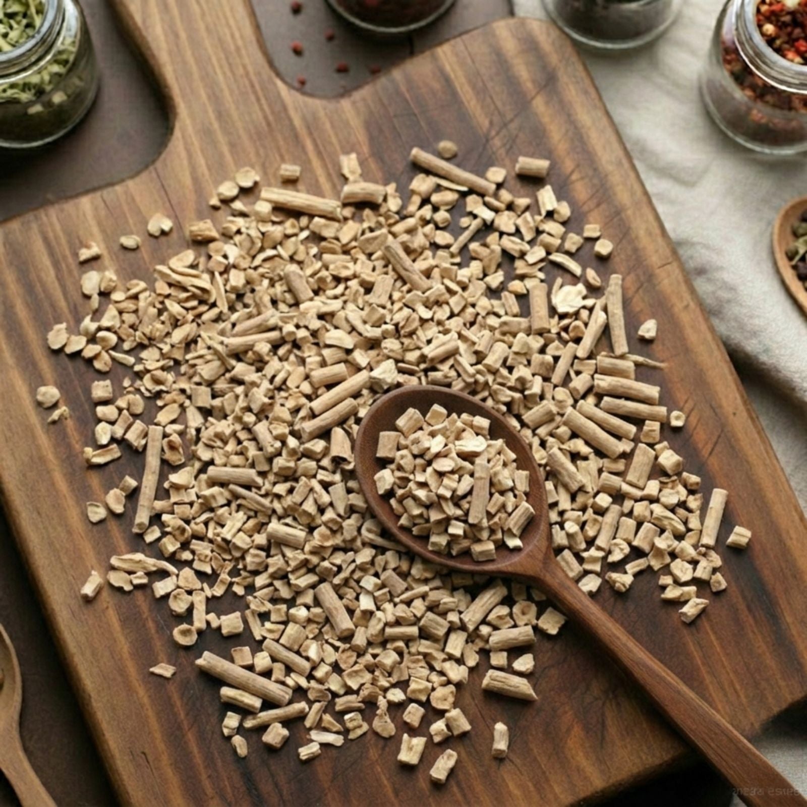 Dry cut and sifted Ashwagandha root (Withania somnifera) for traditional botanical decoctions.