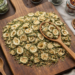 Dried bitter melon slices (Momordica charantia) for botanical infusions.