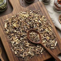 Dry cut and sifted Butcher's Broom root (Ruscus aculeatus) for traditional botanical infusions.