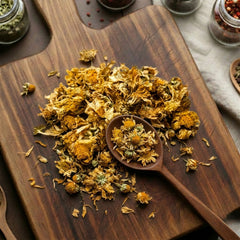 Dry whole Chrysanthemum flowers (Chrysanthemum morifolium) for traditional botanical infusions.