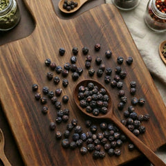 Whole dry Juniper berries (Juniperus communis) for traditional culinary use and botanical infusions.