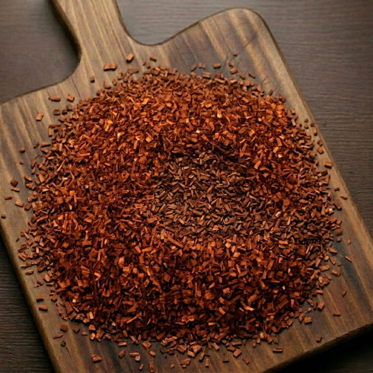 Red Sandalwood chips (Pterocarpus santalinus) for traditional botanical infusions and aromatic ritual use.